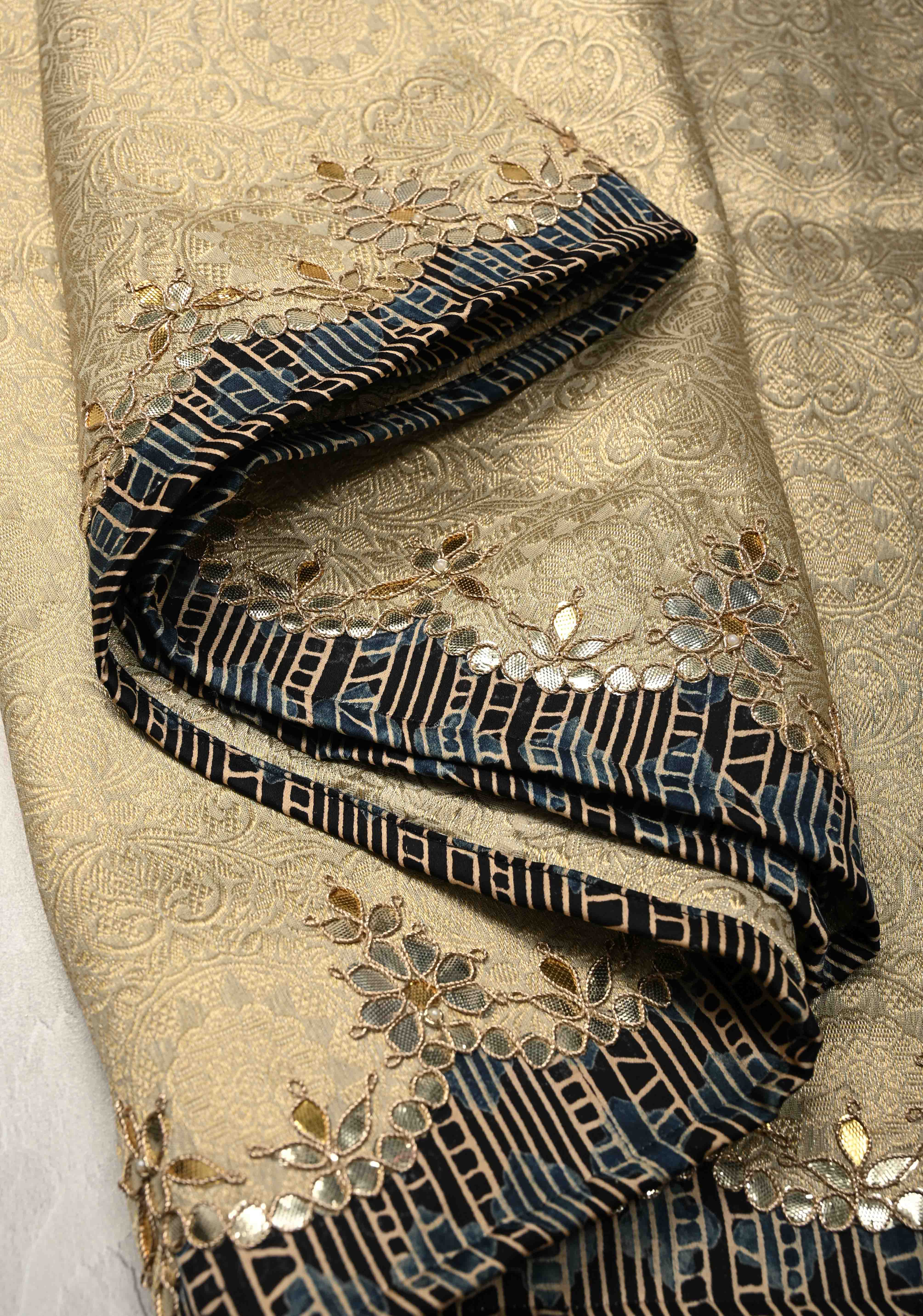Beige Vegan Viscose Tissue Brocade Saree with Ajrakh Applique and Gota Patti work on Scallop Border | Shobitam - Image 7