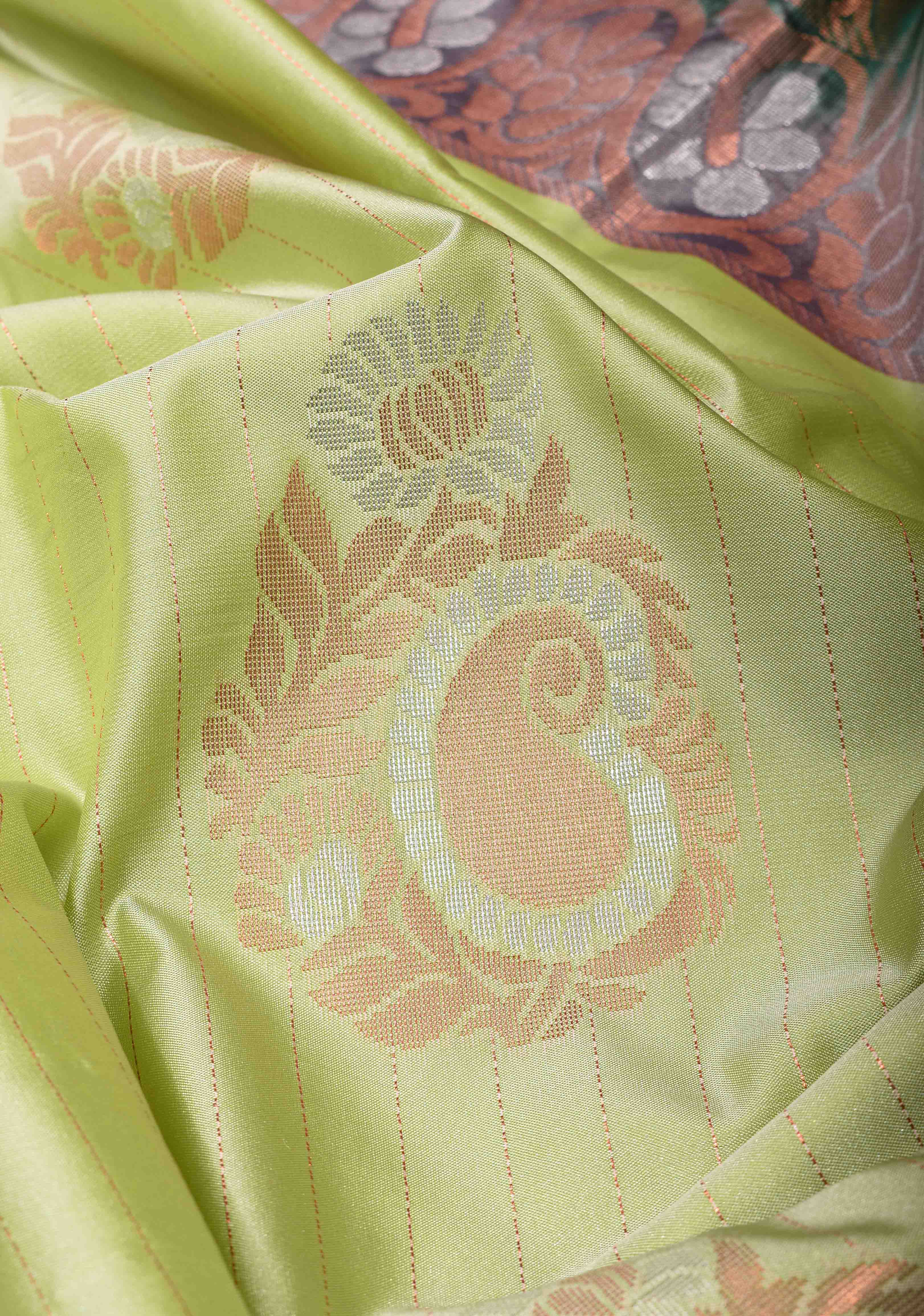 Tea Green Borderless Semi Silk Saree with Zari Stripes and Alfi Paisley Motifs | Shobitam - Image 3