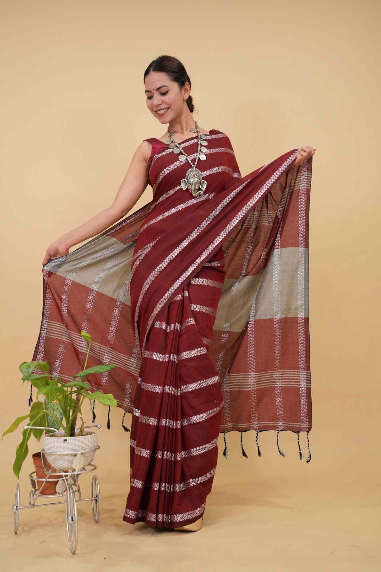 Traditional Naksha Weave  Red Maroon With Silver Thread Overall With Tassels On Pallu Pre Drape Saree - Image 2
