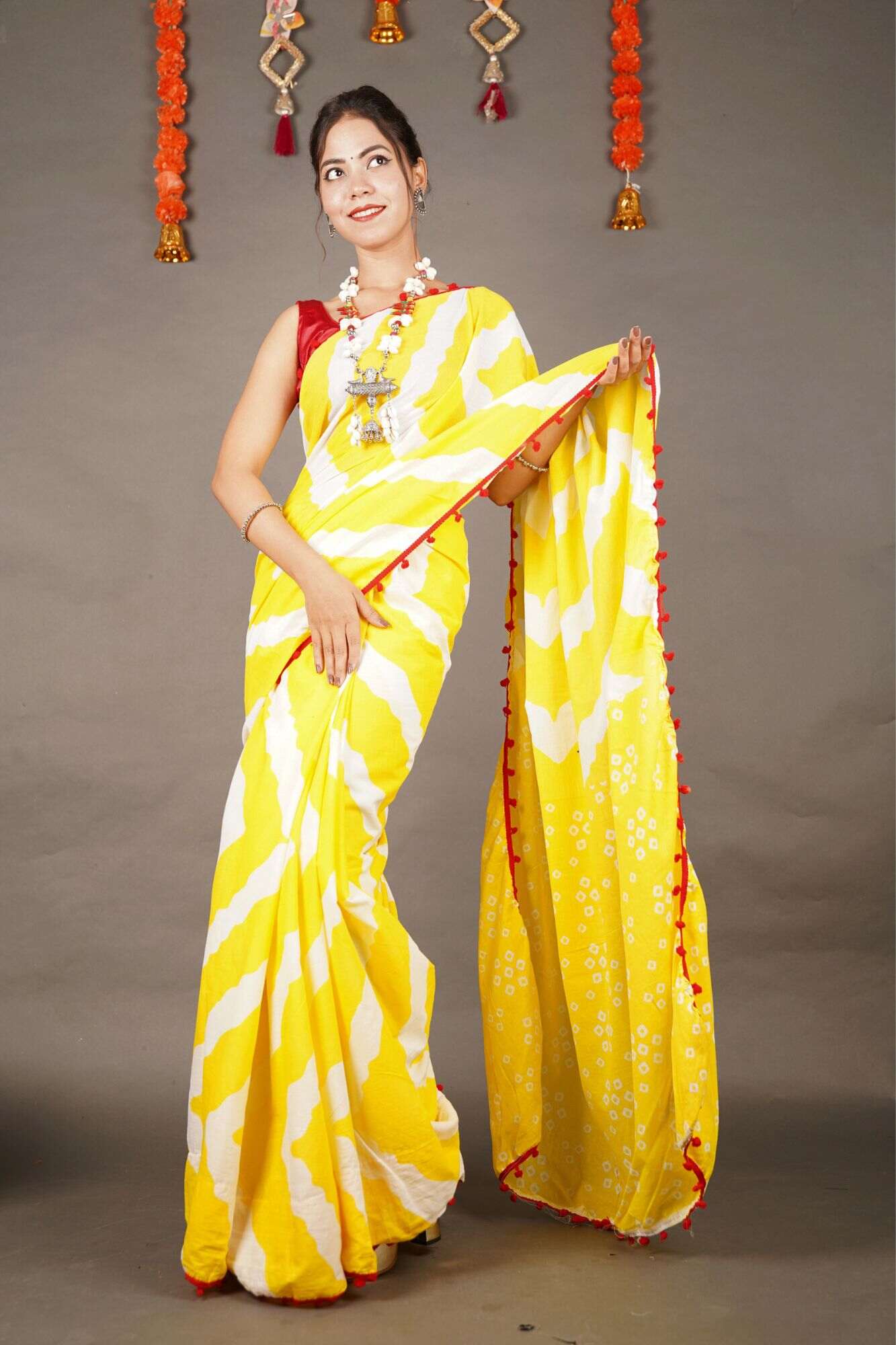 YELLOW AND WHITE COTTON MUL MUL PRINTED SAREE WITH POMPOM - Image 4